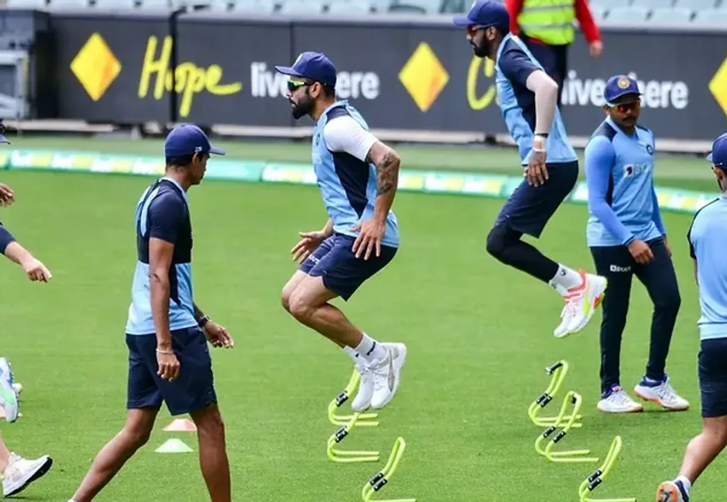 Cricket fitness training exercises - athlete performing explosive lunges on the field