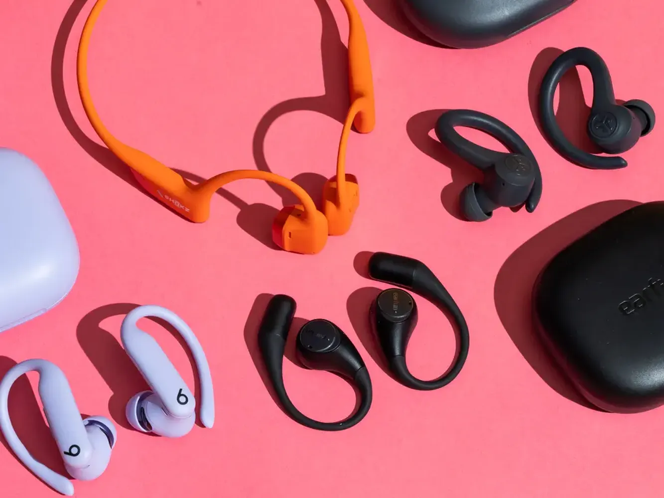 High-quality wireless earbuds for gym and outdoor running being used by an athlete
