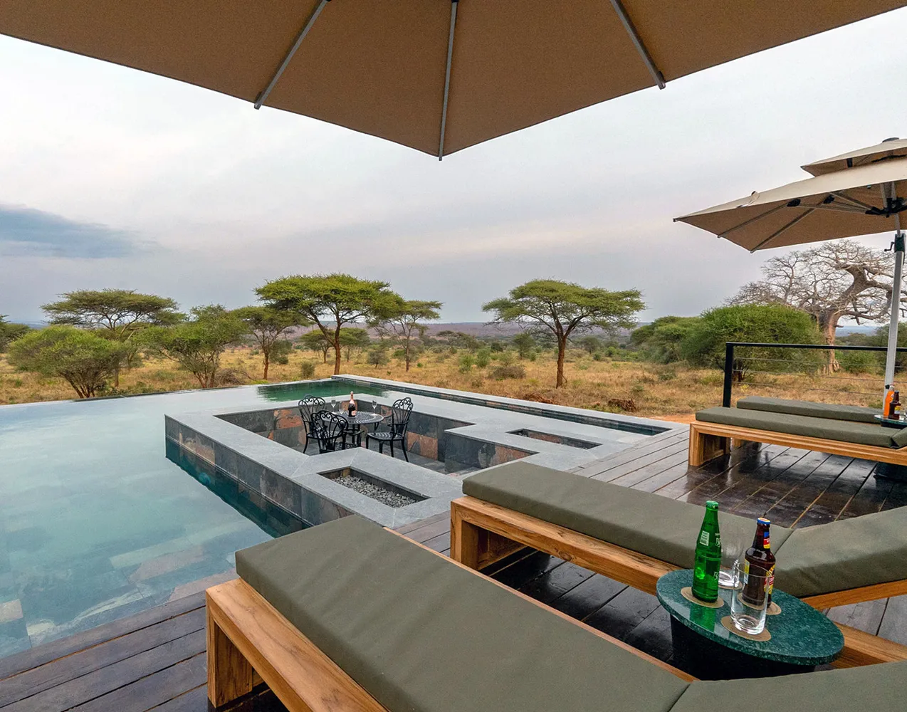 How to book a 6 day luxury safari in tanzania showing ultra luxury safari vehicle and premium bush lodge wilderness scenery