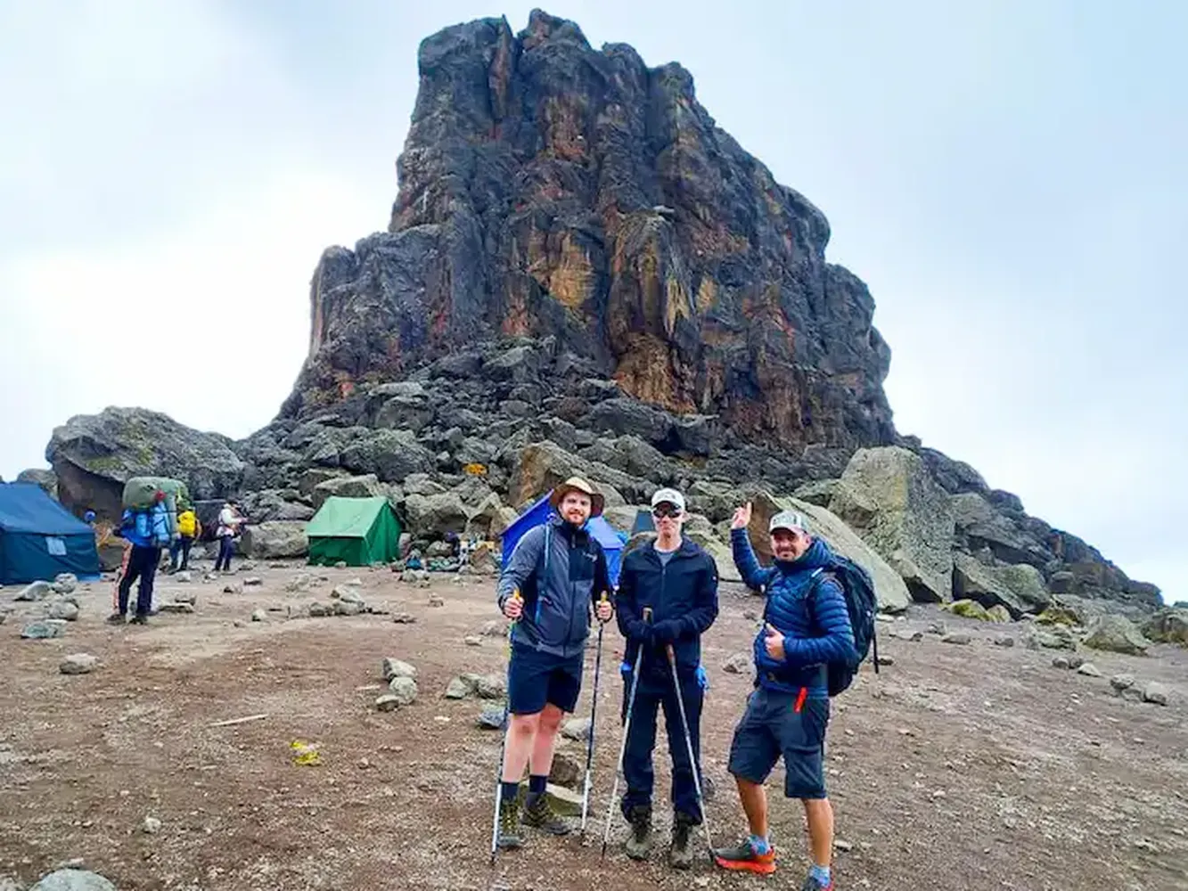 how to choose between 6 day vs 7 day kilimanjaro machame route package - hikers ascending trails on Mount Kilimanjaro
