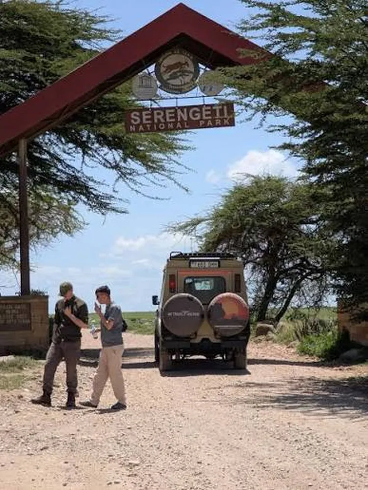 How to fly from Arusha to Serengeti on a 6 day tour - Regional safari aircraft landing on a bush airstrip