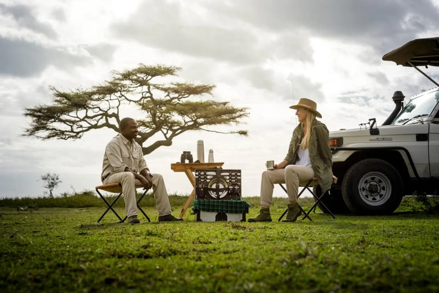 How to time a 6 day luxury safari perfectly - Premium safari vehicle observing wildlife in the savanna