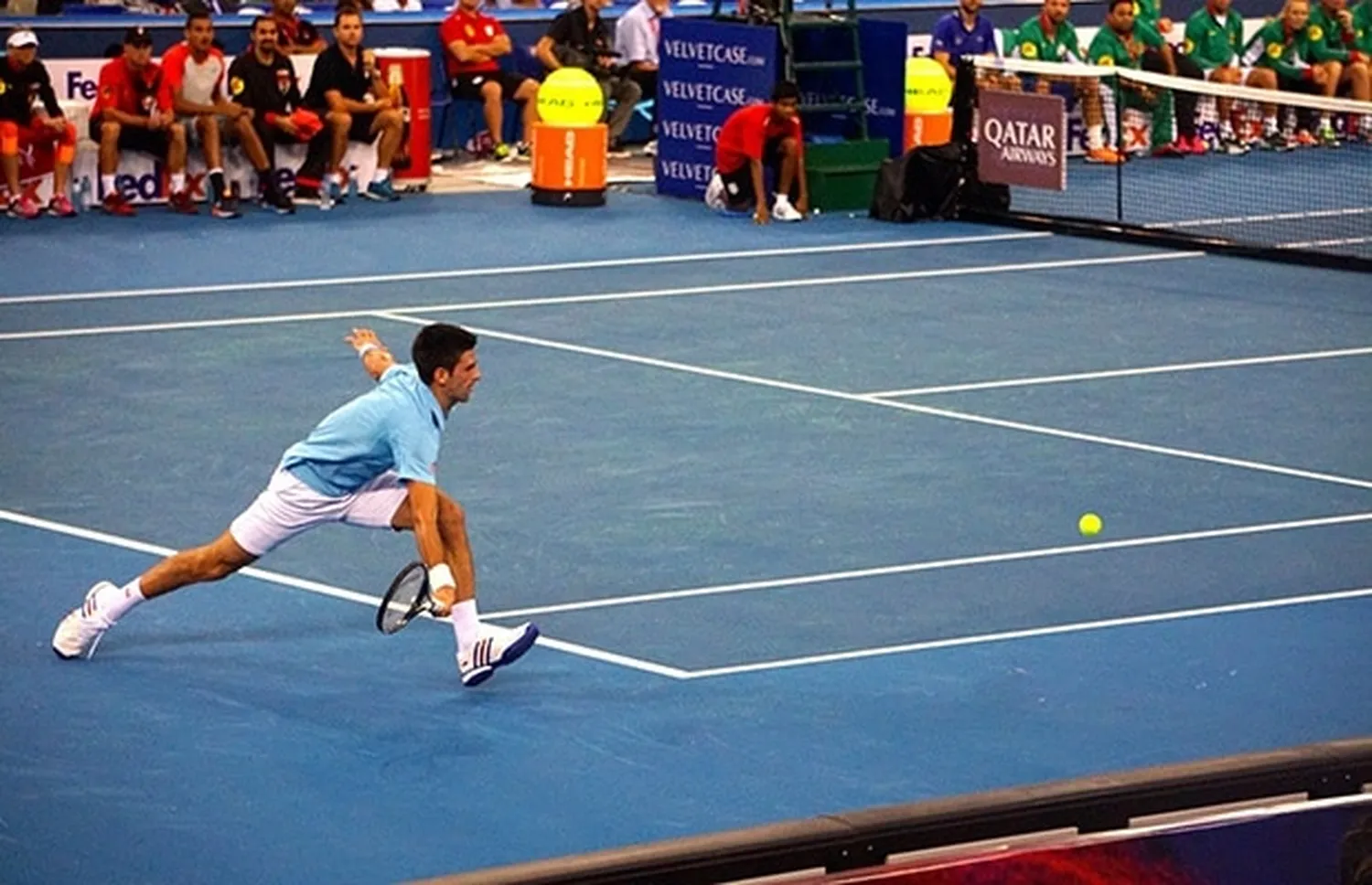 Tennis training drills for beginners practicing on court